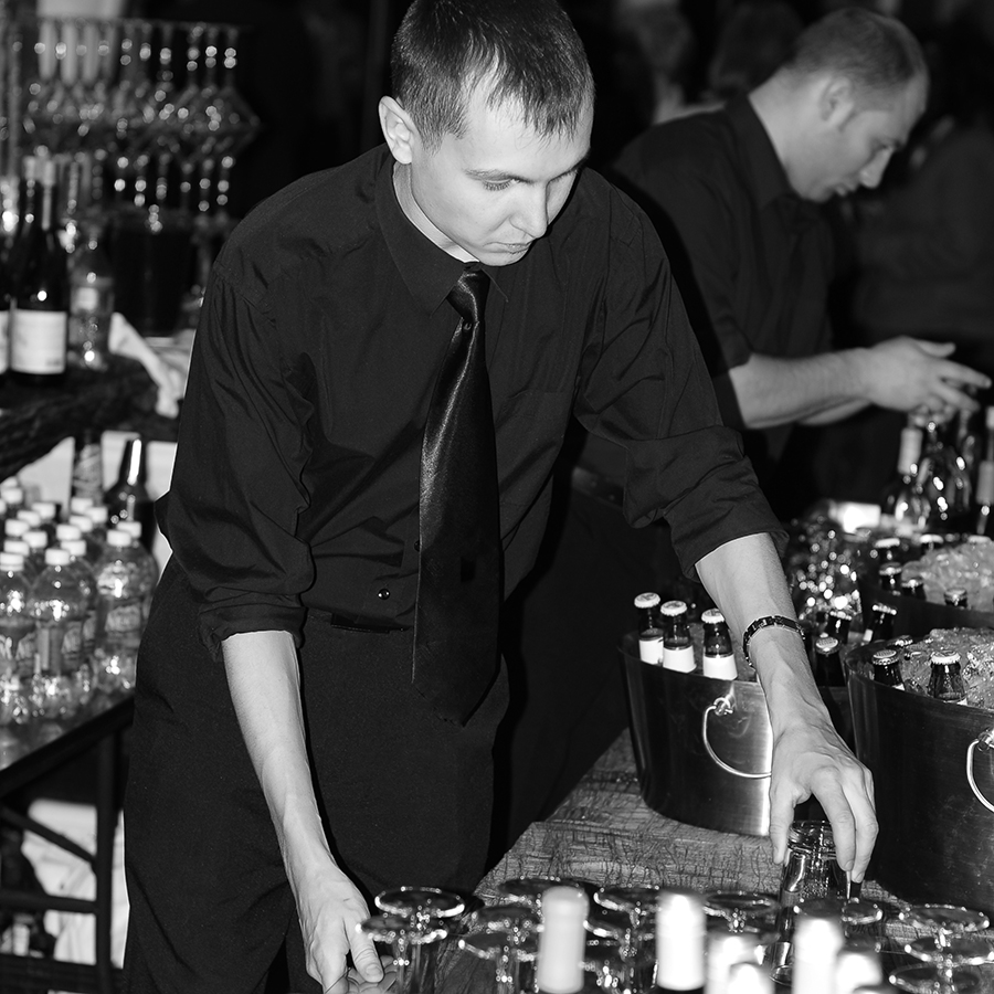 Bartender serving guests
